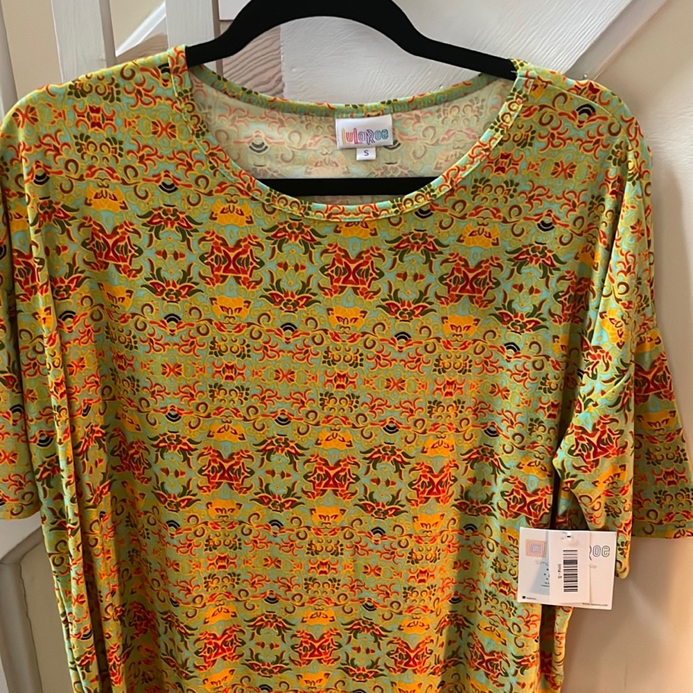 LuLaRoe Irma Top. BNWT. Leggings material. Sooo soft!!
